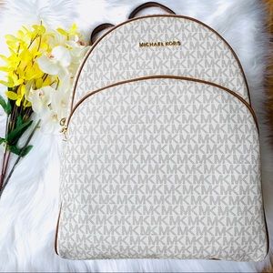 MICHAEL KORS LARGE ABBEY VANILLA CANVAS BACKPACK